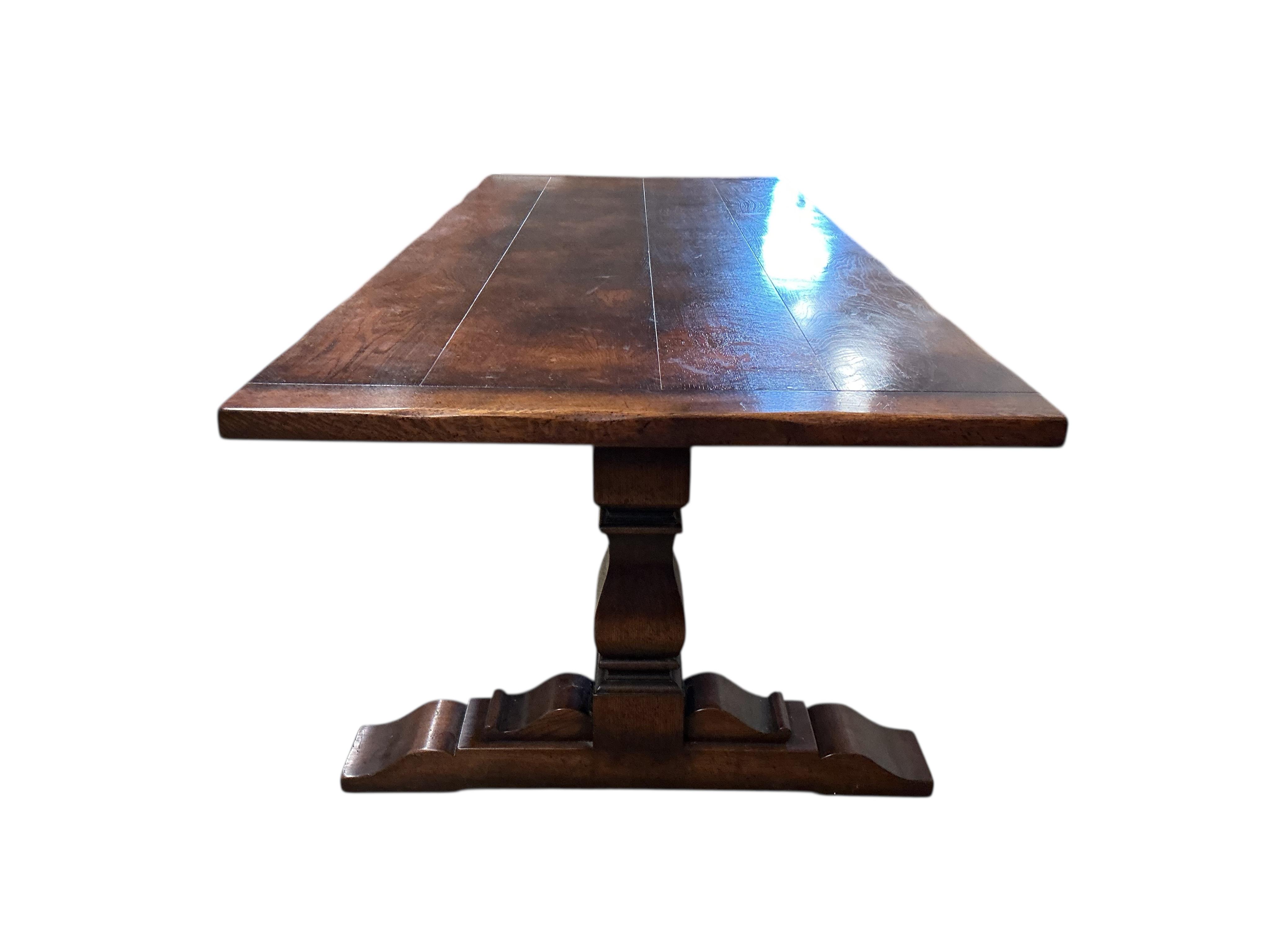 An 18th century style rectangular oak refectory dining table, width 274cm, depth 108cm, height 77cm